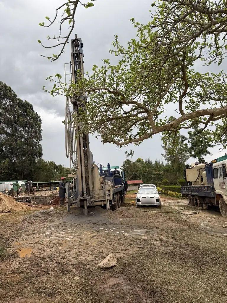 Drilling rig on the grounds of Kaptebee High School, Turbo