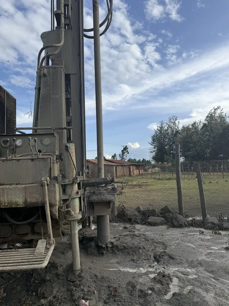 Drilling rig mast over the new borehole at Kaptinga Milk Plant