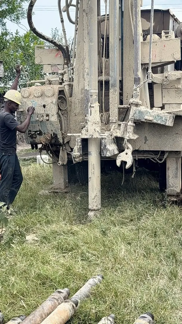 Deep Core Wells rig drilling at Keyo Village