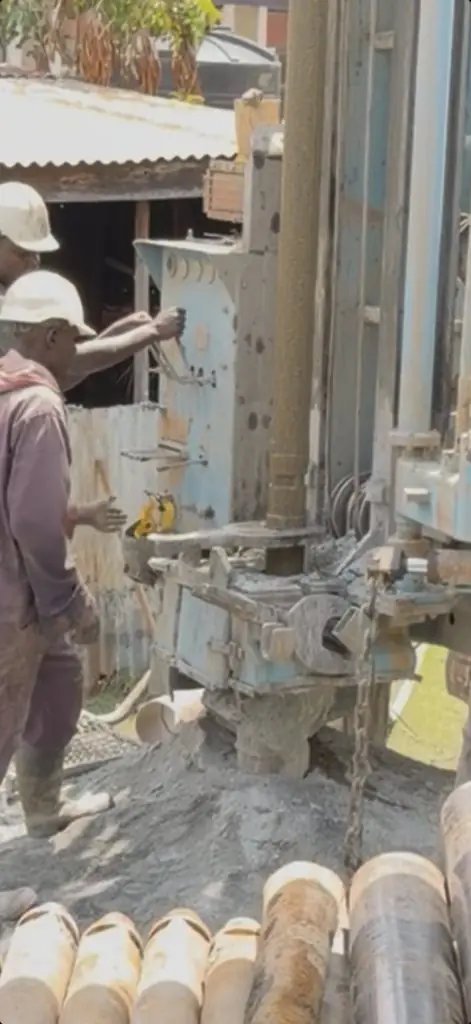 Deep Core Wells crew working the drill string at Sigowet